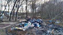 burnt-out homeless campsite